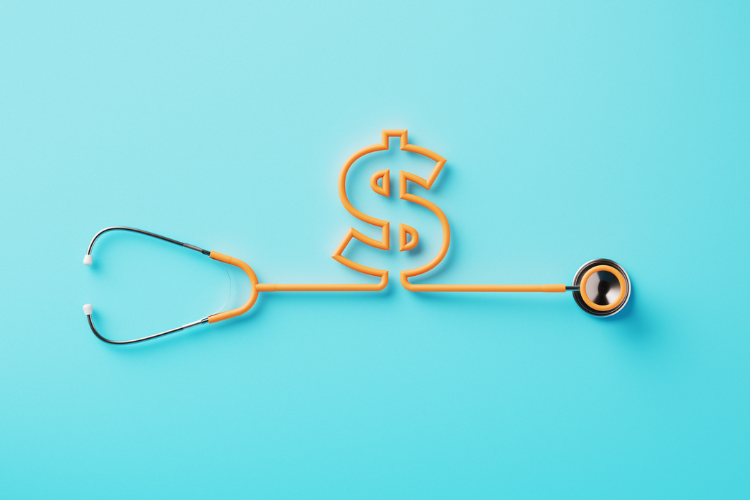 Orange Stethoscope Forming A Dollar Sign