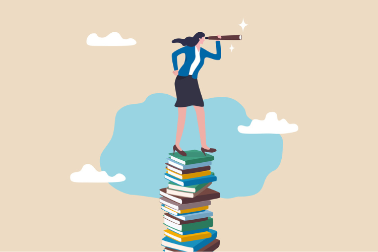 Businesswoman looking out from atop a pile of books